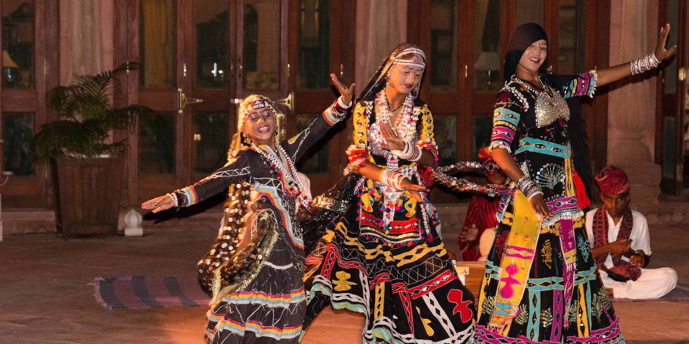 Rajasthani folk dancers and musicians performing in the evening